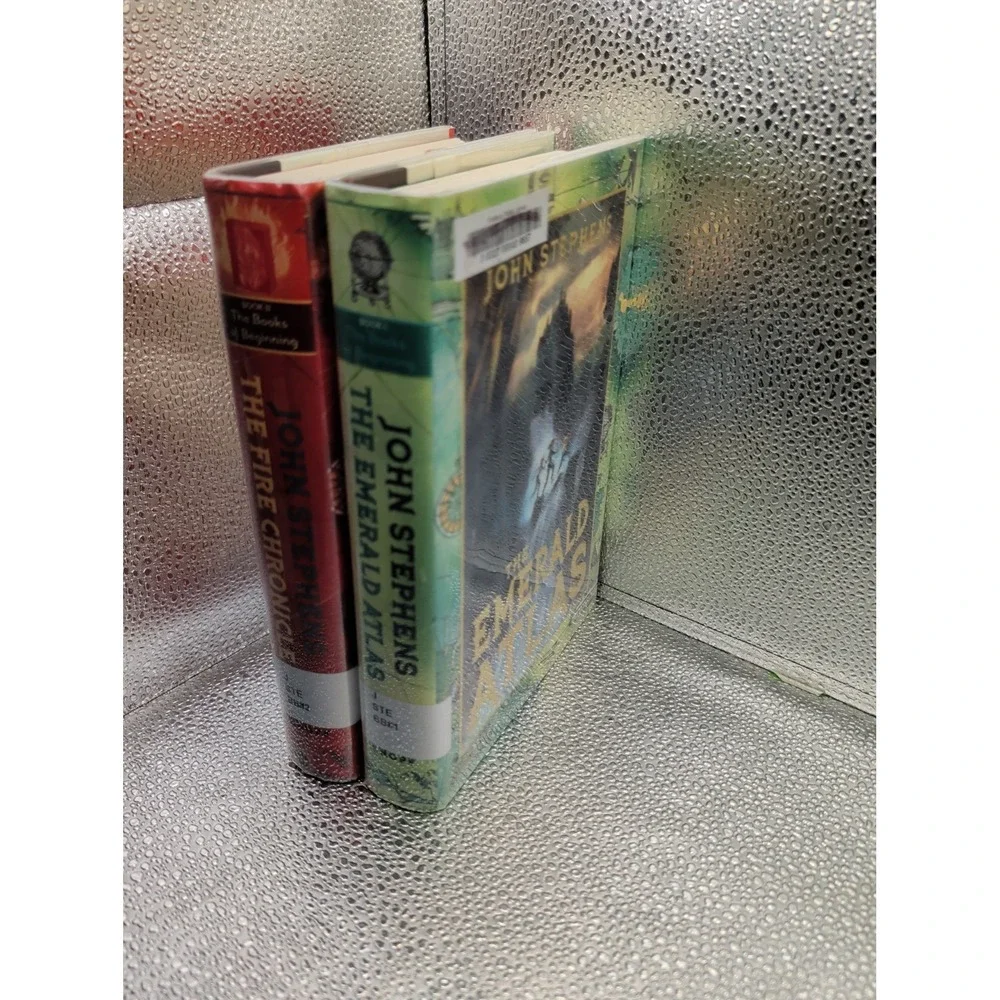 LOT 2 THE BOOKS OF BEGINNING:1 EMERALD ATLAS; 2 FIRE CHRONICLE BY JOHN STEPHENS